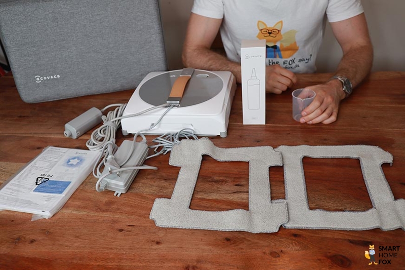 Der gesamte Lieferumfang des Ecovacs WINBOT W1 PRO ist zu sehen